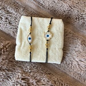 2 pc Arm Candy Eye Candy Bracelets HAMSA EYE MOTHER OF PEARL Black threaded NWT